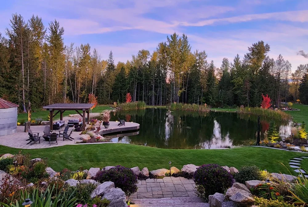 Landscaped pond built by Outdoors by Design